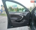 Чорний Опель Інсігнія, об'ємом двигуна 2 л та пробігом 233 тис. км за 11000 $, фото 43 на Automoto.ua