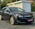 Черный Опель Инсигния, объемом двигателя 2 л и пробегом 175 тыс. км за 11500 $, фото 1 на Automoto.ua