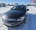 Чорний Опель Інсігнія, об'ємом двигуна 2 л та пробігом 320 тис. км за 9500 $, фото 1 на Automoto.ua