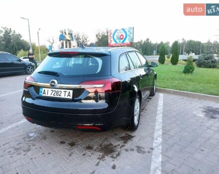 Чорний Опель Інсігнія, об'ємом двигуна 2 л та пробігом 233 тис. км за 11000 $, фото 14 на Automoto.ua
