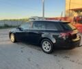 Черный Опель Инсигния, объемом двигателя 2 л и пробегом 340 тыс. км за 7300 $, фото 1 на Automoto.ua
