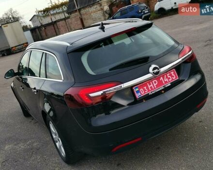 Чорний Опель Інсігнія, об'ємом двигуна 1.96 л та пробігом 205 тис. км за 12999 $, фото 11 на Automoto.ua