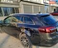 Черный Опель Инсигния, объемом двигателя 2 л и пробегом 290 тыс. км за 10000 $, фото 1 на Automoto.ua