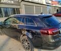 Черный Опель Инсигния, объемом двигателя 2 л и пробегом 290 тыс. км за 10000 $, фото 1 на Automoto.ua