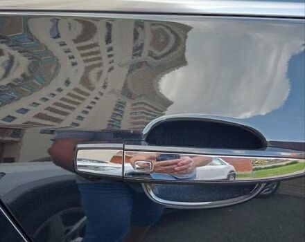 Чорний Опель Інсігнія, об'ємом двигуна 1.96 л та пробігом 198 тис. км за 12500 $, фото 4 на Automoto.ua