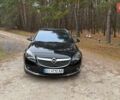 Черный Опель Инсигния, объемом двигателя 2 л и пробегом 270 тыс. км за 9500 $, фото 6 на Automoto.ua