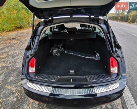 Чорний Опель Інсігнія, об'ємом двигуна 1.96 л та пробігом 205 тис. км за 12999 $, фото 25 на Automoto.ua