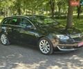 Черный Опель Инсигния, объемом двигателя 1.96 л и пробегом 176 тыс. км за 10950 $, фото 1 на Automoto.ua