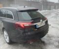 Черный Опель Инсигния, объемом двигателя 2 л и пробегом 323 тыс. км за 11500 $, фото 6 на Automoto.ua