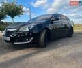Чорний Опель Інсігнія, об'ємом двигуна 1.6 л та пробігом 283 тис. км за 10600 $, фото 1 на Automoto.ua