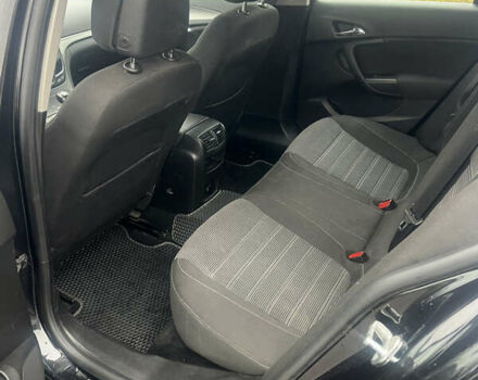 Чорний Опель Інсігнія, об'ємом двигуна 1.6 л та пробігом 210 тис. км за 8400 $, фото 13 на Automoto.ua