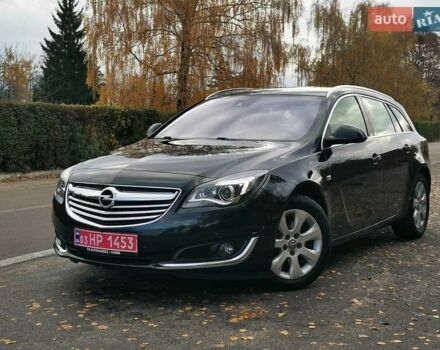 Чорний Опель Інсігнія, об'ємом двигуна 1.96 л та пробігом 205 тис. км за 12999 $, фото 1 на Automoto.ua