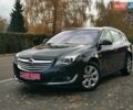 Чорний Опель Інсігнія, об'ємом двигуна 1.96 л та пробігом 205 тис. км за 12999 $, фото 1 на Automoto.ua