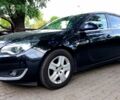 Чорний Опель Інсігнія, об'ємом двигуна 1.96 л та пробігом 291 тис. км за 9600 $, фото 18 на Automoto.ua