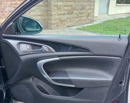 Чорний Опель Інсігнія, об'ємом двигуна 1.96 л та пробігом 198 тис. км за 12500 $, фото 24 на Automoto.ua