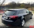 Черный Опель Инсигния, объемом двигателя 2 л и пробегом 250 тыс. км за 9899 $, фото 1 на Automoto.ua