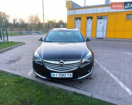 Чорний Опель Інсігнія, об'ємом двигуна 2 л та пробігом 233 тис. км за 11000 $, фото 3 на Automoto.ua