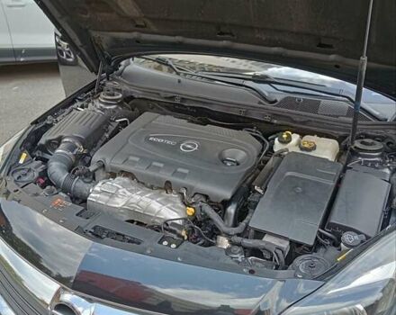 Чорний Опель Інсігнія, об'ємом двигуна 1.96 л та пробігом 198 тис. км за 12500 $, фото 47 на Automoto.ua