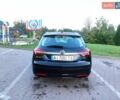 Чорний Опель Інсігнія, об'ємом двигуна 2 л та пробігом 233 тис. км за 11000 $, фото 16 на Automoto.ua