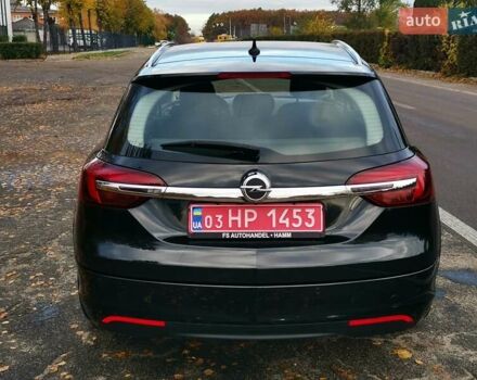 Чорний Опель Інсігнія, об'ємом двигуна 1.96 л та пробігом 205 тис. км за 12999 $, фото 4 на Automoto.ua
