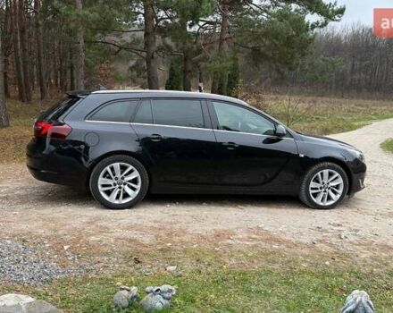 Черный Опель Инсигния, объемом двигателя 2 л и пробегом 270 тыс. км за 9500 $, фото 3 на Automoto.ua