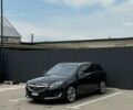 Черный Опель Инсигния, объемом двигателя 2 л и пробегом 224 тыс. км за 12500 $, фото 1 на Automoto.ua