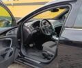 Чорний Опель Інсігнія, об'ємом двигуна 2 л та пробігом 250 тис. км за 10500 $, фото 3 на Automoto.ua