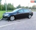 Чорний Опель Інсігнія, об'ємом двигуна 2 л та пробігом 233 тис. км за 11000 $, фото 25 на Automoto.ua