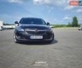 Черный Опель Инсигния, объемом двигателя 2 л и пробегом 220 тыс. км за 10950 $, фото 1 на Automoto.ua