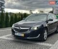 Чорний Опель Інсігнія, об'ємом двигуна 1.96 л та пробігом 250 тис. км за 10500 $, фото 1 на Automoto.ua