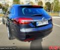 Черный Опель Инсигния, объемом двигателя 2 л и пробегом 254 тыс. км за 12000 $, фото 4 на Automoto.ua