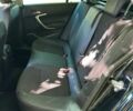 Черный Опель Инсигния, объемом двигателя 1.96 л и пробегом 176 тыс. км за 10950 $, фото 31 на Automoto.ua