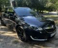 Черный Опель Инсигния, объемом двигателя 2 л и пробегом 212 тыс. км за 10000 $, фото 2 на Automoto.ua