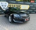 Черный Опель Инсигния, объемом двигателя 1.6 л и пробегом 179 тыс. км за 11800 $, фото 1 на Automoto.ua