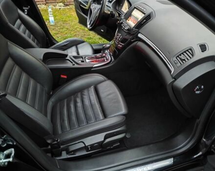 Чорний Опель Інсігнія, об'ємом двигуна 2 л та пробігом 255 тис. км за 10999 $, фото 17 на Automoto.ua