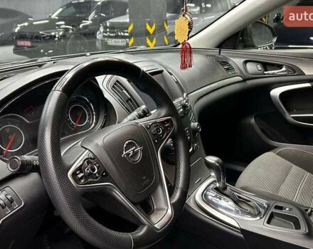 Чорний Опель Інсігнія, об'ємом двигуна 1.96 л та пробігом 324 тис. км за 10800 $, фото 7 на Automoto.ua