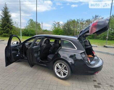 Чорний Опель Інсігнія, об'ємом двигуна 1.96 л та пробігом 290 тис. км за 10900 $, фото 13 на Automoto.ua