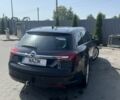 Черный Опель Инсигния, объемом двигателя 1.6 л и пробегом 230 тыс. км за 12500 $, фото 3 на Automoto.ua