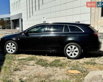 Черный Опель Инсигния, объемом двигателя 1.6 л и пробегом 154 тыс. км за 12300 $, фото 3 на Automoto.ua