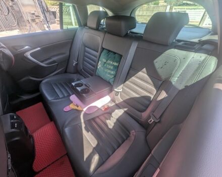 Черный Опель Инсигния, объемом двигателя 2 л и пробегом 290 тыс. км за 10905 $, фото 4 на Automoto.ua