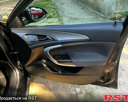 Черный Опель Инсигния, объемом двигателя 2 л и пробегом 218 тыс. км за 10500 $, фото 3 на Automoto.ua