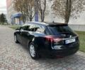 Черный Опель Инсигния, объемом двигателя 2 л и пробегом 196 тыс. км за 13511 $, фото 4 на Automoto.ua