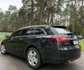 Чорний Опель Інсігнія, об'ємом двигуна 2 л та пробігом 248 тис. км за 9299 $, фото 5 на Automoto.ua