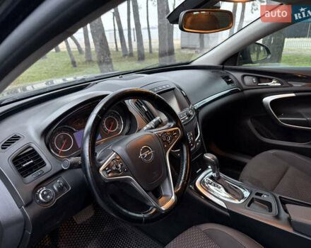 Чорний Опель Інсігнія, об'ємом двигуна 1.6 л та пробігом 276 тис. км за 8700 $, фото 5 на Automoto.ua