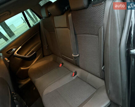 Чорний Опель Інсігнія, об'ємом двигуна 1.6 л та пробігом 276 тис. км за 8700 $, фото 29 на Automoto.ua