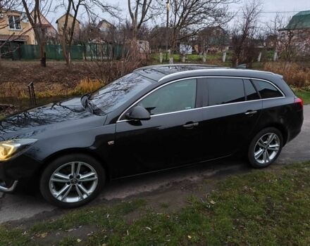 Чорний Опель Інсігнія, об'ємом двигуна 2 л та пробігом 255 тис. км за 10999 $, фото 3 на Automoto.ua