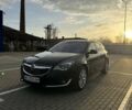 Черный Опель Инсигния, объемом двигателя 2 л и пробегом 160 тыс. км за 11900 $, фото 1 на Automoto.ua