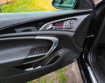 Чорний Опель Інсігнія, об'ємом двигуна 2 л та пробігом 255 тис. км за 10999 $, фото 11 на Automoto.ua