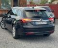 Чорний Опель Інсігнія, об'ємом двигуна 1.6 л та пробігом 195 тис. км за 11900 $, фото 1 на Automoto.ua