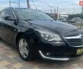 Чорний Опель Інсігнія, об'ємом двигуна 1.96 л та пробігом 270 тис. км за 11690 $, фото 1 на Automoto.ua